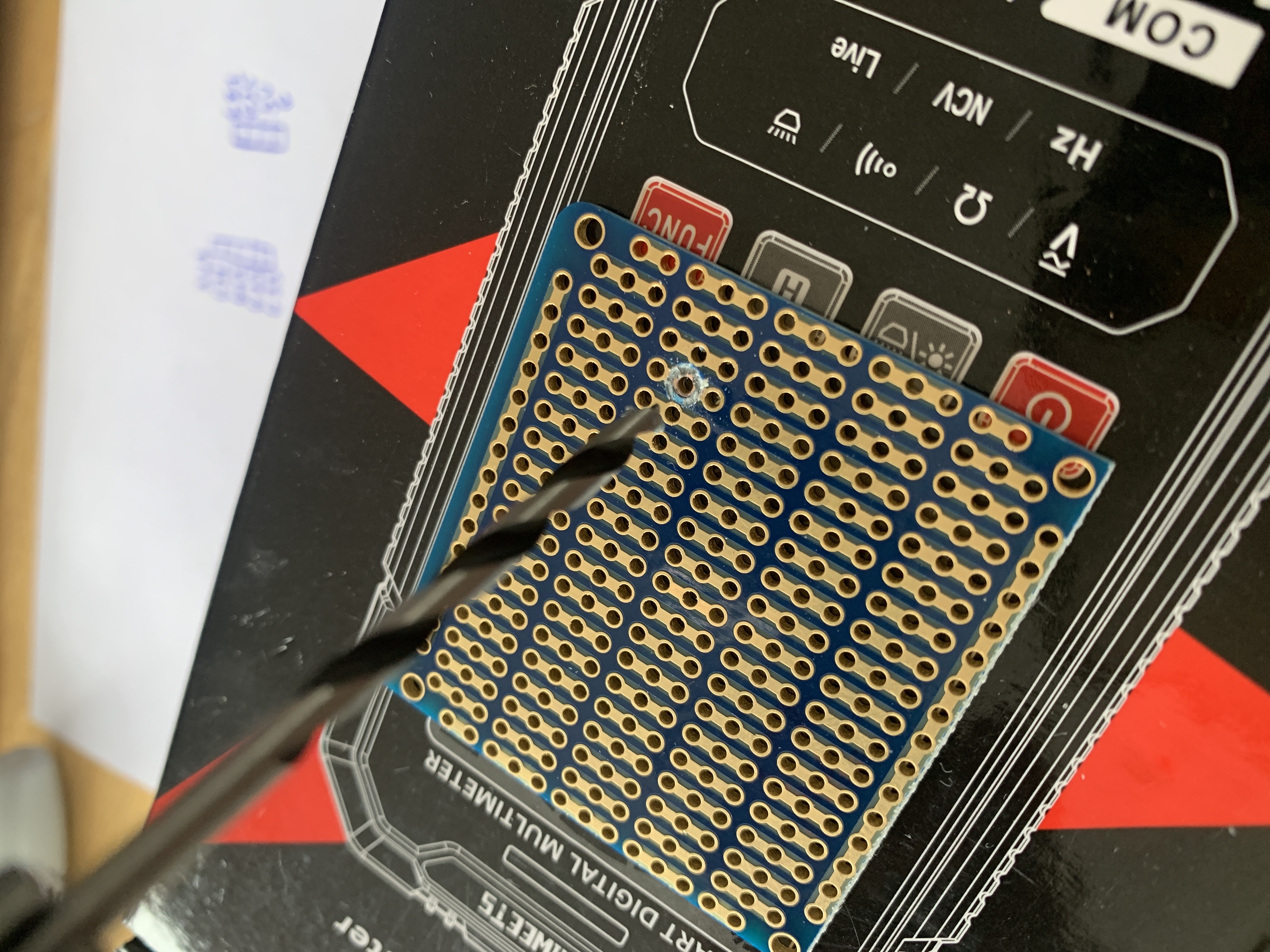 Hey, at least I put something between the breadboard and the table.